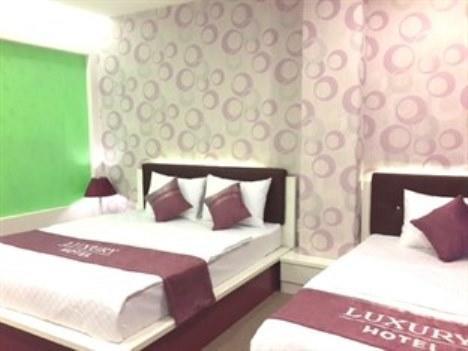 Luxury Hotel Ho Şi Min Oda fotoğraf