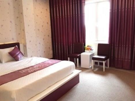 Luxury Hotel Ho Şi Min Oda fotoğraf